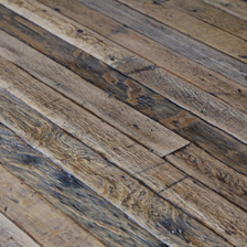 Reclaimed hardwood tongue and groove strip flooring allows you to create a unique floor from rare or exotic species