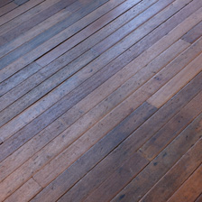 Reclaimed hardwood tongue and groove strip flooring allows you to create a unique floor from rare or exotic species