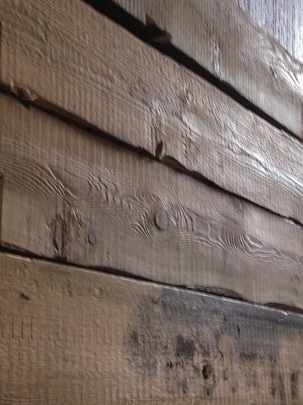 very old and antique reclaimed timber, some hand-adzed, can be used to create panels for feature areas in walls, ceilings or furniture to a one-off design