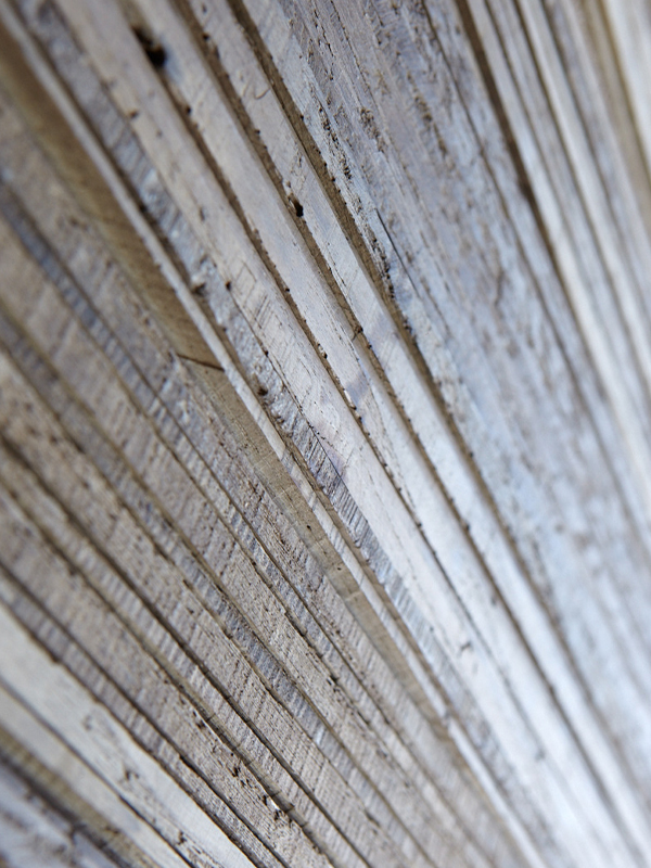 very old and antique reclaimed timber, some hand-adzed, can be used to create panels for feature areas in walls, ceilings or furniture to a one-off design