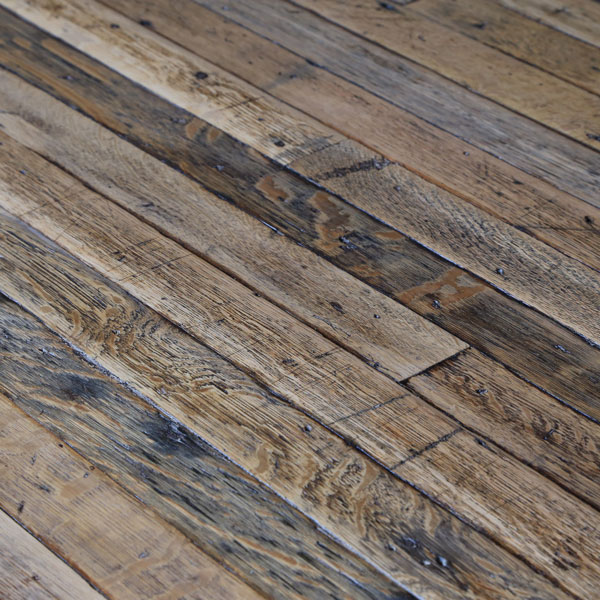 Reclaimed and machined floorboards produce a soft, subtle and timeworn floor